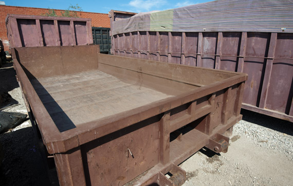 Lowboy and 40 yard dumpsters at Los Angeles yard